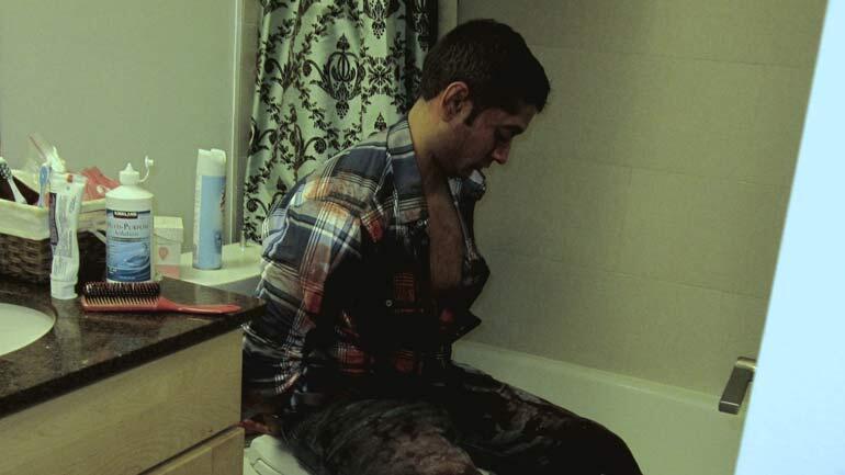 A bloody Rahul Gupta at the crime scene