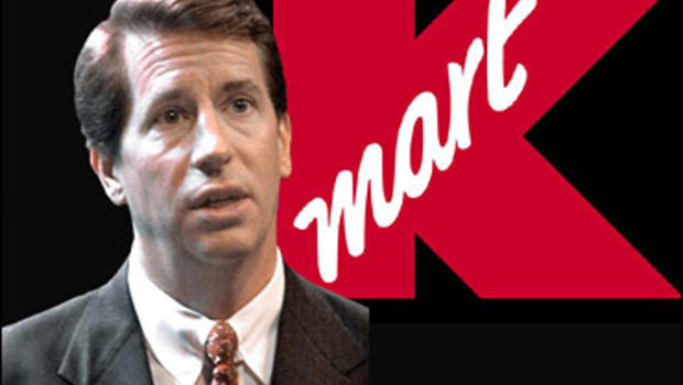 Chuck Conaway, chairman and CEO of Kmart Corp., in May 2001 headshot, shown against Kmart logo, for story about civil suit accusing him of billing personal ... - image584609x