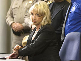 Gov. Jan Brewer signs bill SB1070 dealing with illegal immigration during a news conference at the Arizona Department of Transportation in Phoenix on Friday, April 23, 2010. (AP Photo/The Arizona Republic, Tom Tingle)