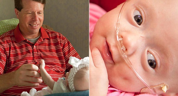 Jim Bob Duggar and baby Josie Brooklyn Duggar.