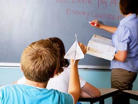 child, kid, classroom, adhd, attention problems, attention deficit, paper airplane, school, generic, stock, trouble maker