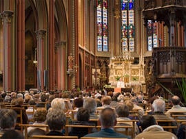 Full church, with Roman Catholic service.