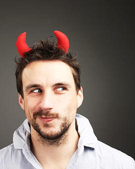 man in costume red horns