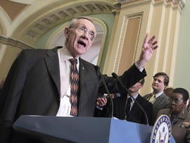 Sen. Harry Reid addresses reporters on Capitol Hill
