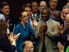 In this image from House Television, Rep. Gabrielle Giffords, D-Ariz., appears on the floor of the House of Representatives Monday, Aug. 1, 2011, in Washington. Giffords was on the floor for the first time since her shooting earlier this year, attending a vote on the debt standoff compromise