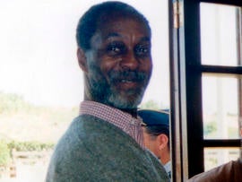 U.S. fugitive George Wright is seen in a post office in Praia das Macas, Portugal, in 2000 in this photo released by Noticias de Colares Sept. 29, 2011. Wright was arrested Sept. 26, 2011, by Portuguese authorities at the request of the U.S. government after more than 40 years as a fugitive, authorities said. The FBI says Wright, who escaped Bayside State Prison in Leesburg, N.J., in 1970 became affiliated with the Black Liberation Army and in 1972 he and his associates hijacked a Delta flight from Detroit to Miami. After releasing the passengers in exchange for a $1 million ransom, the hijackers forced the plane to fly to Boston, then on to Algeria. Wright is being held in Lisbon, the capital of Portugal, pending extradition hearings. He has asked to be released while the extradition process goes forward, and the court handling the case is considering his request, according to U.S. officials.