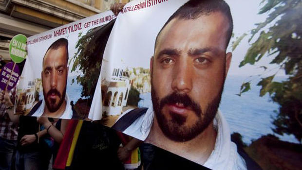 Demonstrators tried to raise awareness of the 2008 murder of <b>Ahmet Yildiz</b> <b>...</b> - 111012-Ahmet_Yildiz