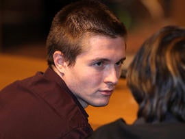 Raffaele Sollecito waits in Perugia's Court of Appeal Oct. 3, 2011, in Perugia, Italy, before hearing that he won his appeal against his murder conviction.