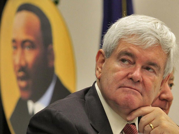 Presidential candidate Newt Gingrich, listens to speakers at the Martin Luther King Jr. celebration breakfast, Jan. 16, 2012 at the Canal Street Recreation Center in Myrtle Beach.