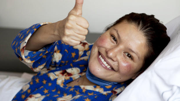 <b>Erika Hernandez</b>, 28, gives a thumbs up from inside an ambulance after being <b>...</b> - droppedhearttransplant