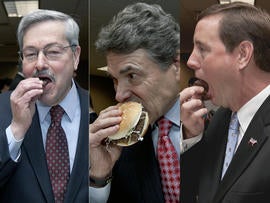 Iowa Gov. Terry Branstad, Texas Gov. Rick Perry, and Nebraska Lt. Gov. Rick Sheehy eat pink slime hamburgers