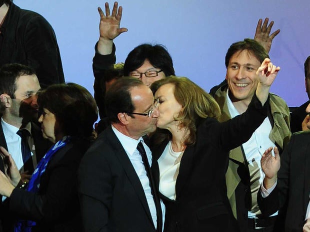 French president-elect Francois Hollande, left, embraces his companion Valerie Trierweiler after greeting crowds gathered to celebrate his election victory in Bastille Square in Paris, France handed the presidency Sunday to leftist Hollande, a champion of government stimulus programs who says the state should protect the downtrodden - a victory that could deal a death blow to the drive for austerity that has been the hallmark of Europe in recent years.