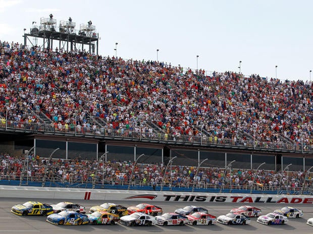 TALLADEGA, AL - MAY 06: Brad Keselowski, driver of the #2 Miller Lite Dodge, and Matt Kenseth, driver of the #17 Best Buy Ford, lead the field to a restart during the NASCAR Sprint Cup Series Aaron's 499 at Talladega Superspeedway on May 6, 2012 in Talladega, Alabama. (Photo by Tyler Barrick/Getty Images)