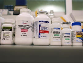 Bottles of antibiotics line a shelf at a Publix Supermarket pharmacy Aug. 7, 2007, in Miami.