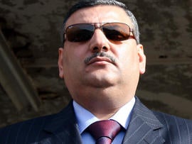 Then-Syrian Agriculture Minister Riad Hijab is seen Nov. 24, 2008, in Quneitra, Syria.