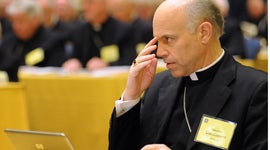 Bishop Salvatore Cordileone of Oakland, Calif. makes the sign of the cross during the fall meeting of the U.S. Conference of Catholic Bishops Monday, Nov. 15, 2010 in Baltimore.