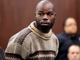 Naeem Davis stands in front of Judge Lynn Kotler during his arraignment on murder charges Dec. 5, 2012, in New York.