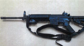 This image provided by the Fontana Unified School District Police shows a Colt LE6940 semiautomatic rifle, one of 14 purchased by the Fontana Unified School District to help provide security for the school, in California. The weapons, which cost $1,000 each, are high-powered weapons that are accurate at longer range and can pierce body armor.