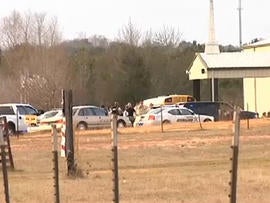 Scene outside church where hostage drama unfolded Jan. 29, 2013 in Midland City, Ala. after, sheriff says, gunman killed school bus driver and took six-year-old off bus and held him