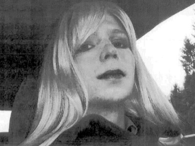 Army Pfc. Chelsea Manning poses for a picture wearing a wig and lipstick in this undated picture provided by the U.S. Army when she was known as Bradley.