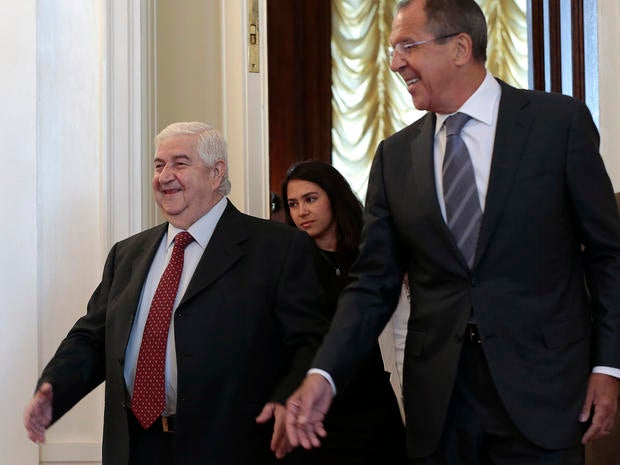 Russian Foreign Minister Sergey Lavrov welcomes his Syrian counterpart Walid Muallem to Moscow