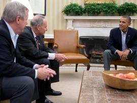 From left, Sen. Dick Durbin, D-Ill., Sen. Charles Schumer, D-N.Y., and President Obama meet in the Oval Office of the White House Oct. 12, 2013, in Washington.