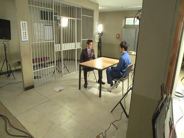 Actors on a set during the filming of a South Korean television drama