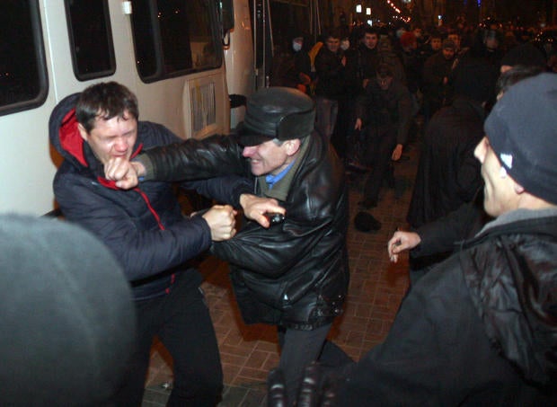 Pro-Russian supporters clash with pro-Ukrainian activists during a rally in the eastern Ukrainian city of Donetsk