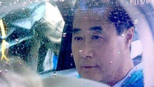 Leland Yee arrives at the San Francisco Federal Building in custody.