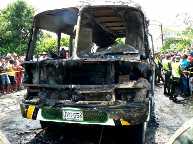 The charred remains of a bus, in which children died in, is seen in Fundacion, northern Colombia
