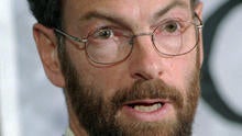Dr. Richard Rockefeller speaks at a news conference in Portland, Maine, April 12, 1999.