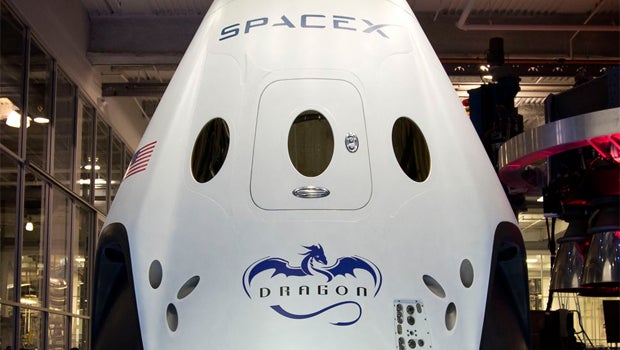 Boeing, SpaceX to team with NASA on space taxis - CBS News