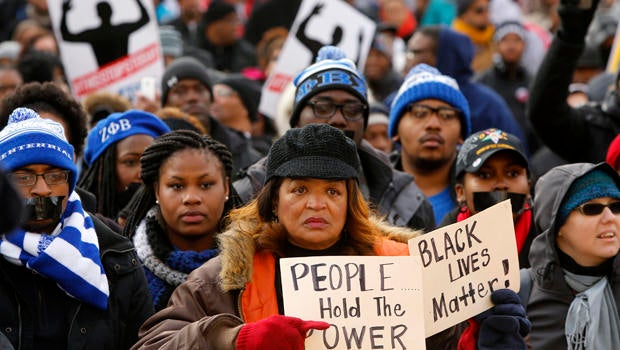 People gather for the start of the national Justice For All march, led by civil rights activist the Rev. Al Sharpton, against police violence in Washington Dec. 13, 2014.