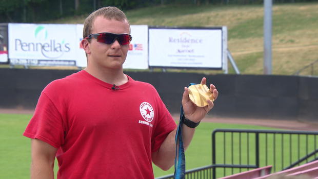 josh-pauls-shows-his-gold-medal-from-vancouver-credit-cbs.jpg