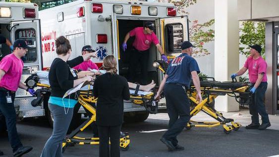 A patient is wheeled into the emergency room at Mercy Medical Center following a shooting at Umpqua Community College in Roseburg, Oregon, Oct. 1, 2015.