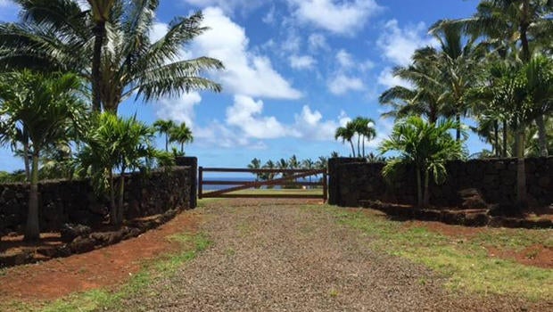 Some of Facebook CEO Mark Zuckerberg's neighbors are grumbling about a rock wall he's having built on his property on the north shore of the Hawaiian island of Kauai.