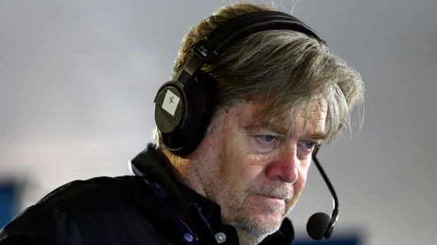 Stephen K. Bannon looks at his computer to see who will be the next caller he will talk to while hosting Brietbart News Daily on SiriusXM Patriot at Quicken Loans Arena on July 20, 2016, in Cleveland, Ohio.