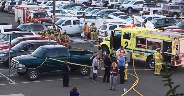 Small plane crashes onto cars at Reno airport - CBS News Small plane crashes onto cars at Reno airport - CBS News