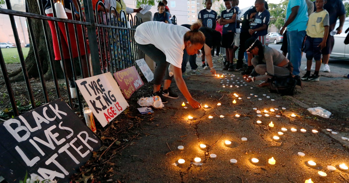 Vigil for police shooting victim, 13, who cops say had BB gun - CBS News