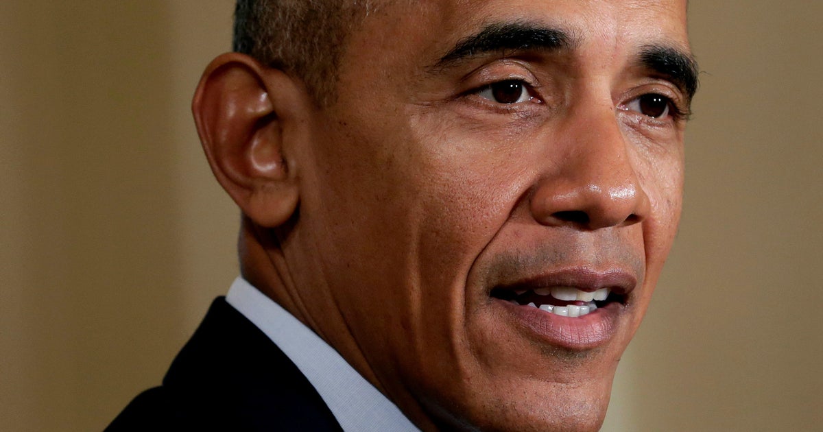 Obama signs short-term spending bill, averting government shutdown - CBS News