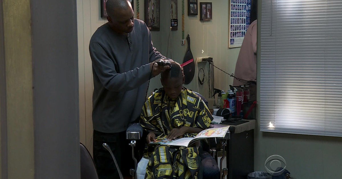 Read a book, get a $2 discount at this Michigan barber shop