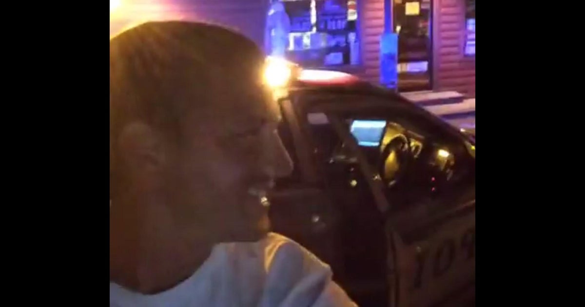 Man allegedly steals squad car, posts videos as police chase him - CBS News