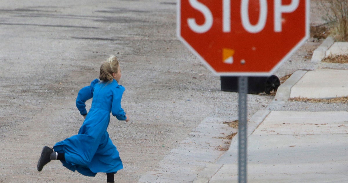 Feds: Police forces should be disbanded in two polygamous towns - CBS News