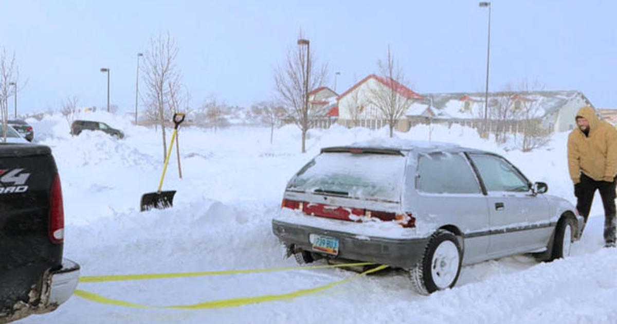 Snow and frigid weather hit millions across U.S.