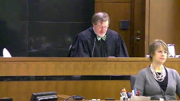 This still image taken from United States Courts shows Judge James Robart listening to a case at the federal courthouse in Seattle on March 12, 2013, in Seattle.