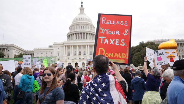 'Who paid for' rallies seeking release of tax returns 'Who paid for' rallies seeking release of tax returns