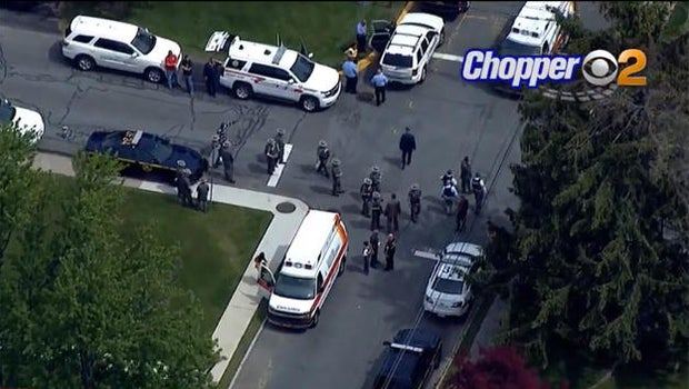 Officer shot, suspect barricaded in Orange County home