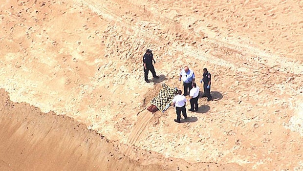 Body washes up on Massachusetts shore in front of beachgoers