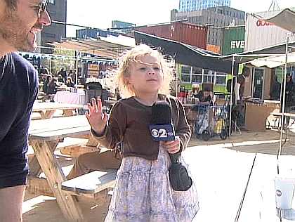 Budding reporter, 3-year-old Mason 