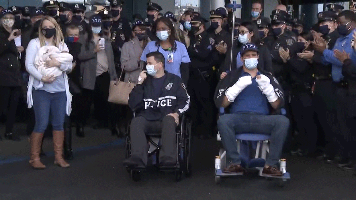NYPD-officers-released-from-hospital.gif 